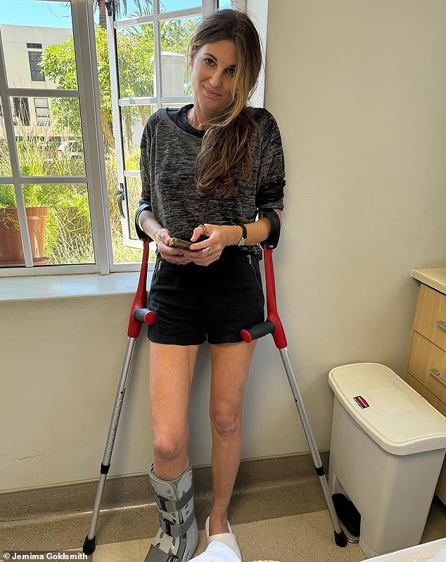 The daughter of Lady Annabel Goldsmith and the ex-wife of cricketer Imran Khan had her leg fitted in an Aircast as she smiled for a photo while leaning on crutches in her hospital room