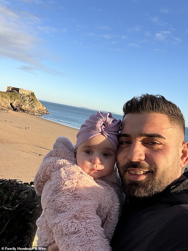 Six-month-old Sophia Kelemen is held by her father. She was said to have been visiting the popular seaside resort with her family and friends when she was hit by a Nissan Qashqai