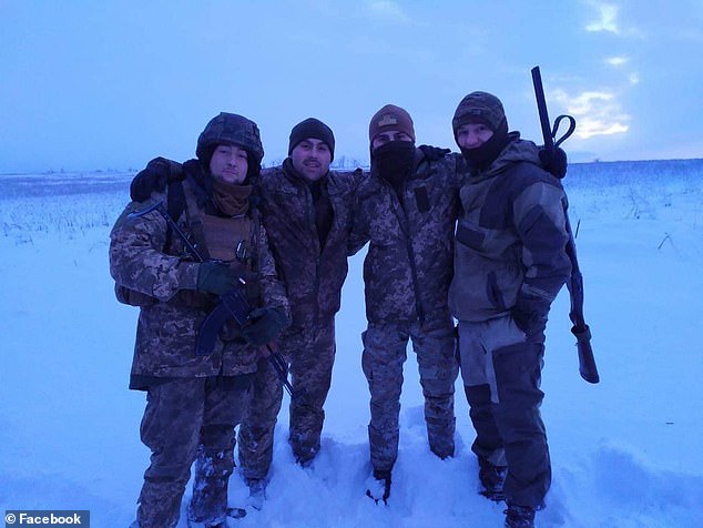 Roman Jr., pictured left, is pictured with his fellow soldiers