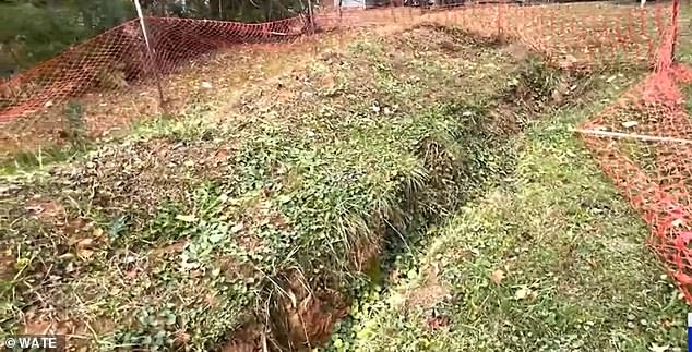 Now she is stuck in the ditch in her backyard and worries about the risks this poses to passers-by