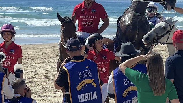 In the video, Zara can be seen smiling as she holds the reins of two horses, just before the third horse took off, lunged forward and landed on her shoulder.