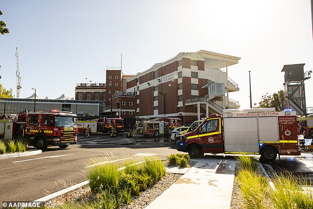 Police have obtained copies of the CCTV footage that is expected to play a role in the ongoing investigation into the cause of the fire (photo, emergency services on scene)