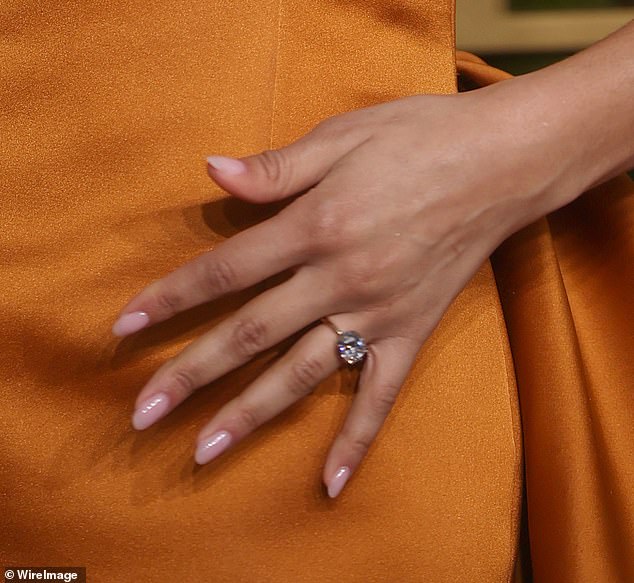 The insider opened up about the star's decision to reveal her ring on Sunday, explaining: 'Zendaya knew what she was doing when she wore that ring'