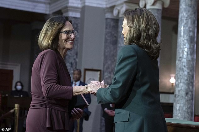 Vice President Kamala Harris, right, shakes hands with Sen. Deb Fischer, R-Neb., during a ceremonial swearing-in ceremony at the Capitol in Washington, Friday, Jan. 3, 2025