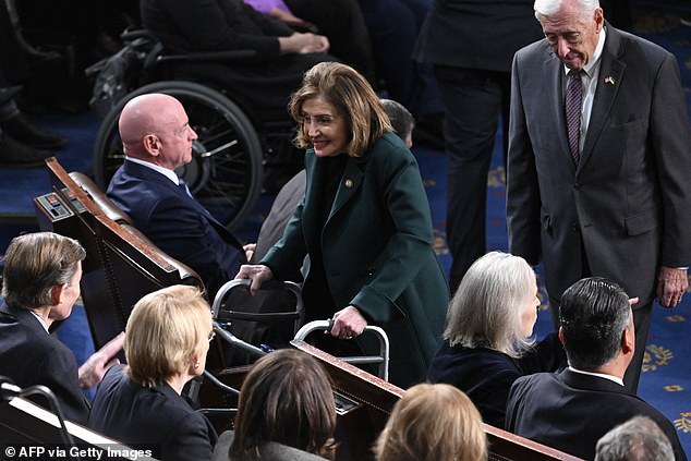 Pelosi walks down the aisle on the House floor on January 6, 2024