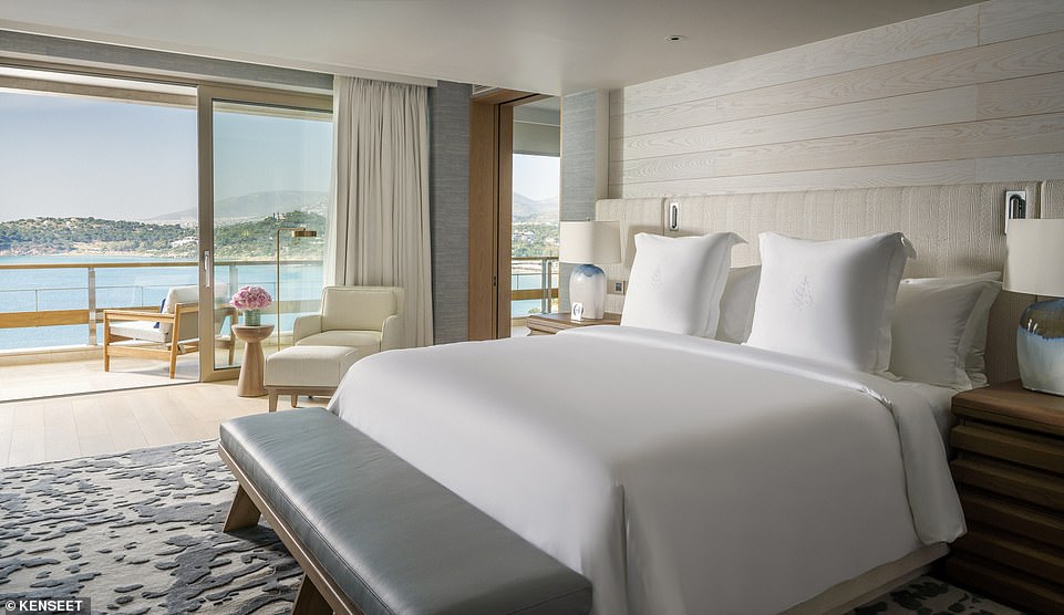 Fiona writes: 'The view over the Saronic Gulf from our master bedroom and terrace is so captivating that it takes a moment to register the luxury within.' Above: an Arion suite with panoramic sea views