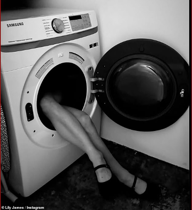 A black and white photo showed Lily showing off lots of legs as she sat in a washing machine and stuck her legs out