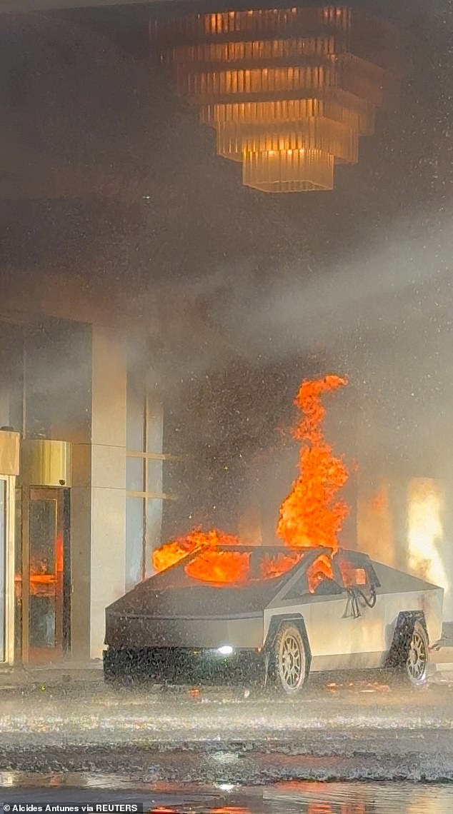 Flames rise from a Tesla Cybertruck after it exploded outside the Trump International Hotel Las Vegas, in Las Vegas, Nevada, USA, January 1