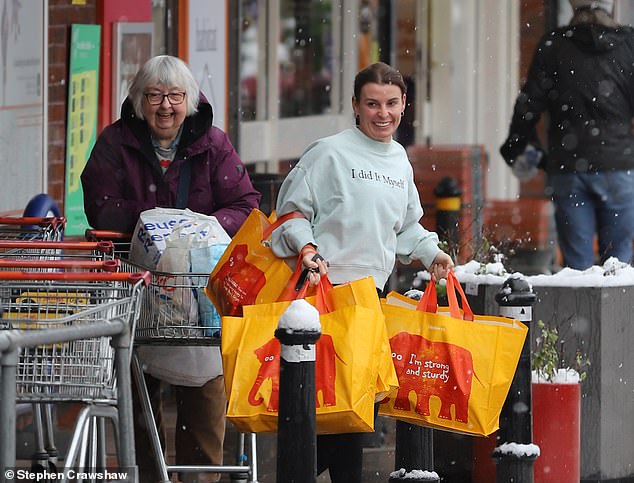 The mum-of-four, 38, who won legions of fans for her 'good attitude' on I'm A Celebrity, was pictured in a food shop in Wilmslow, Cheshire, on Tuesday.