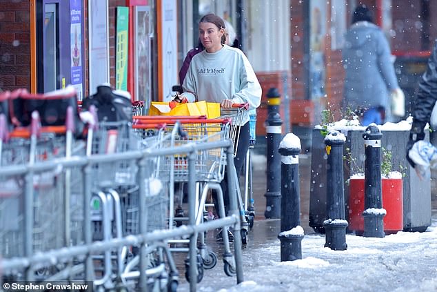 Coleen wore a pastel sweatshirt with the slogan 'I did it own', along with a pair of tight-fitting leggings and trainers