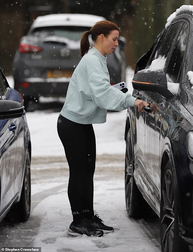 After laughing with a fellow shopper, Coleen headed back to her 4x4 with her heavy load of carrier bags