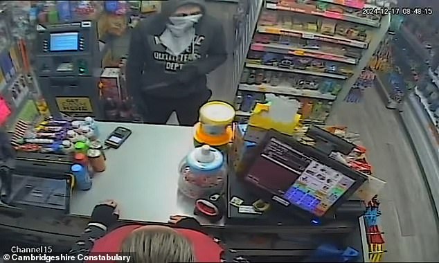 The man threatens a female store clerk and demands cash from the register, but she refuses. A large knife is clearly visible in the man's hand, but he puts it down as soon as a customer enters the store