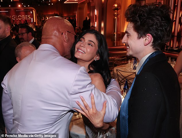 “She wanted this night to be all about Timothee, how it was meant to be,” the source told Page Six; the couple is seen at the ceremony with Dwayne 'The Rock' Johnson