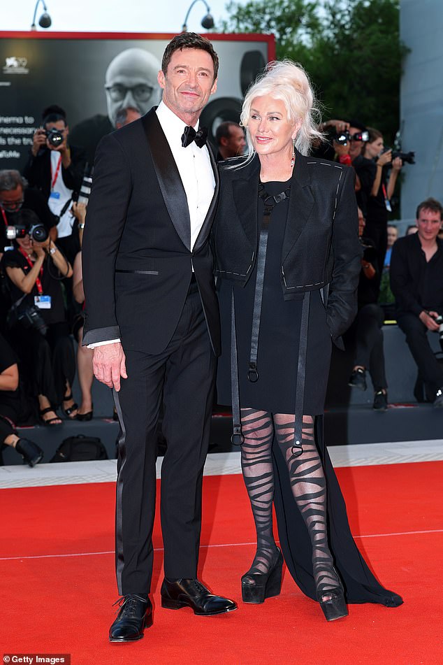 Sutton's glamorous shoe choice was a far cry from Deborra's signature chunky shoes she often wears during red carpet appearances