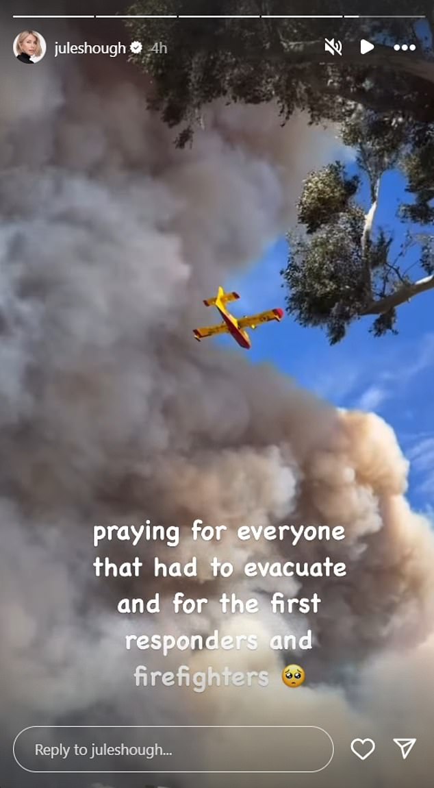 Julianne Hough, who lives in Hollywood Hills, shared footage from her backyard showing a Canadair CL-415, a yellow plane used to fight wildfires, flying through smoke