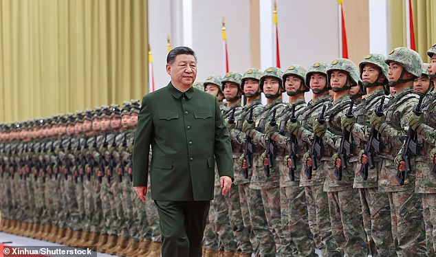 President Xi Jinping assesses troops during his inspection of the Chinese People's Liberation Army (PLA) garrison stationed in the Macau Special Administrative Region, southern China, December 20, 2024. The country has ambitions in the Arctic, such as the 'Polar Silk Road'