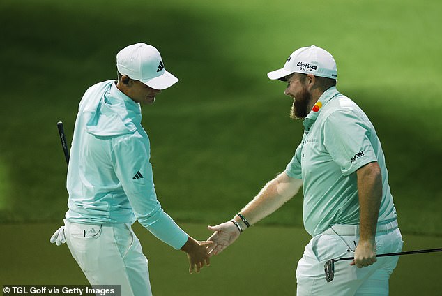 Aberg and Shane Lowry celebrate during their Week 1 beating in New York