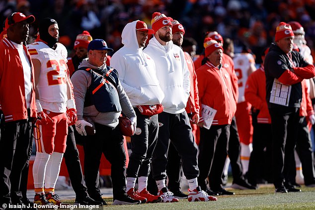 Kelce and Mahomes watched from the sidelines as the Broncos defeated a rotated Chiefs 38-0