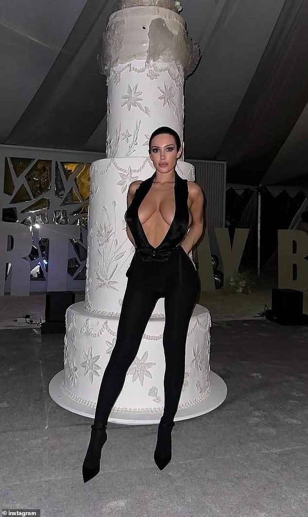 Censori dons a black bodysuit with a plunging neckline for a star-studded birthday party