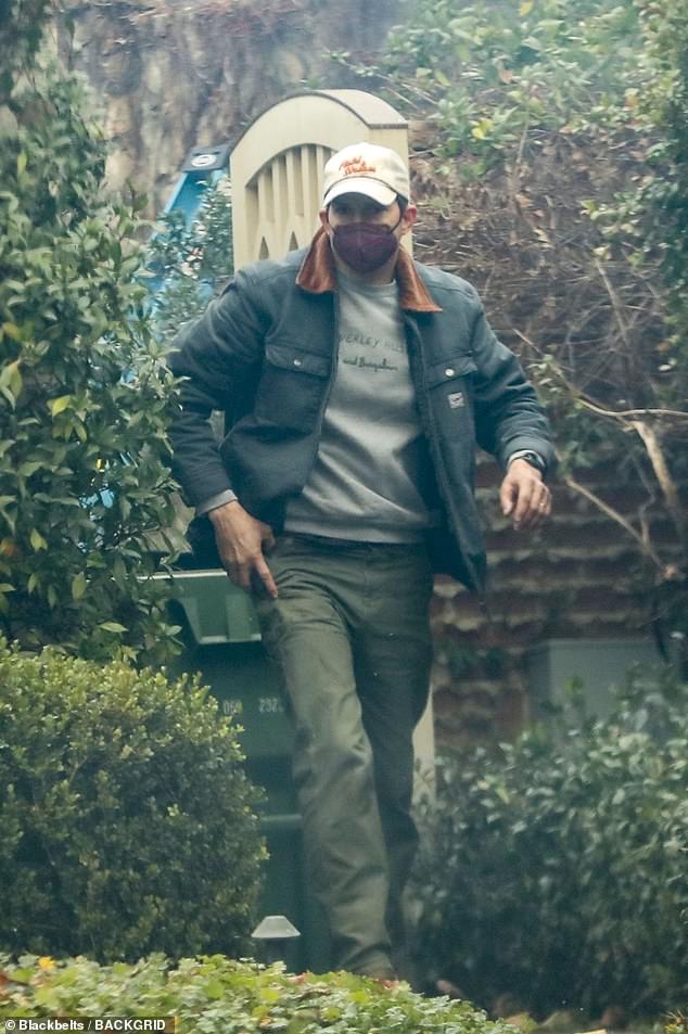 The That '70s Show star, 46, was spotted Wednesday lending a helping hand as he hosed down a house near burning properties located near Reese Witherspoon's former residence in the Pacific Palisades