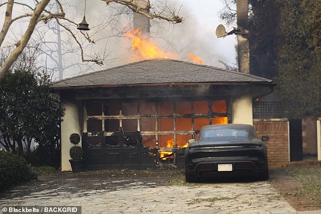 Other houses on the street Kutcher drove through were already on fire (as seen above)