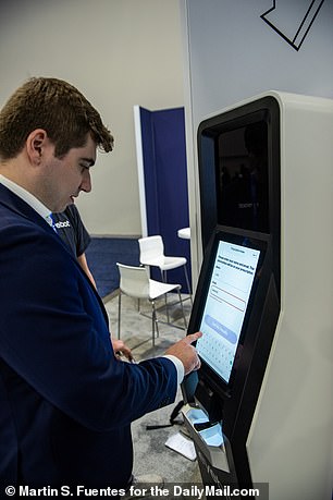 The eye testing machine is tried out by a reporter from DailyMail.com