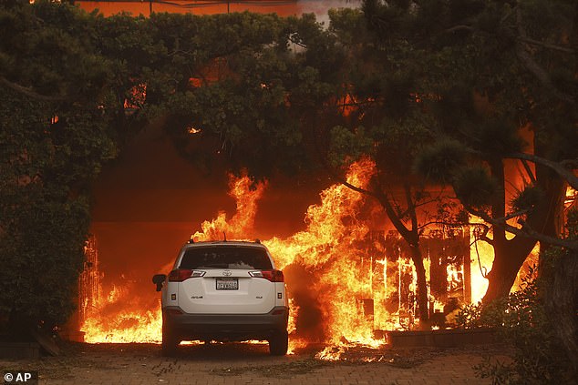 Los Angeles has been ravaged by a series of deadly fires that have so far killed two people and spread across more than 25,000 acres.