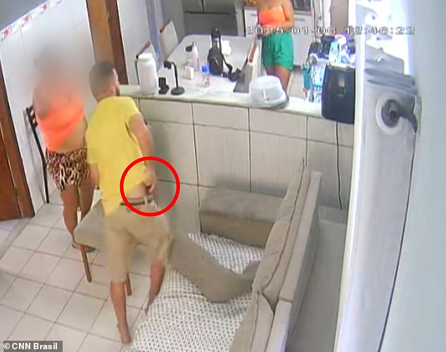 Brazilian Navy sailor Jailton Silva puts away his gun (circled) during an argument with his estranged wife Elaine Silva (above left) before shooting her dead and killing himself at their former home in Rio de Janeiro on Monday