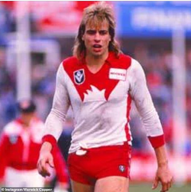 Capper scored 388 goals over a 124-game career and twice finished runner-up in the Coleman Medal (pictured, playing for the Sydney Swans)