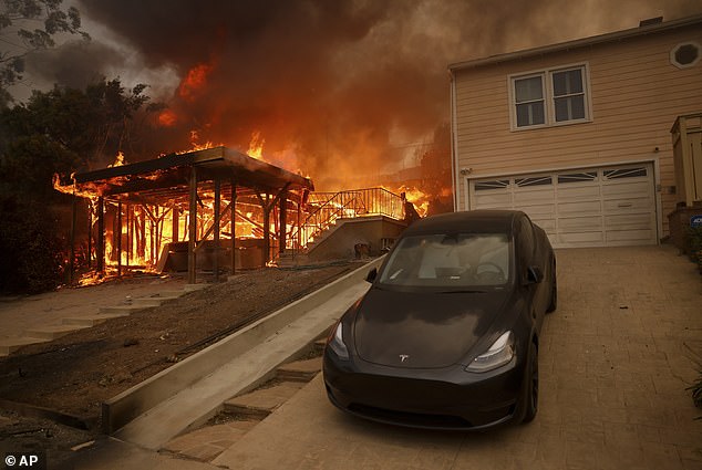 The Palisades Fire — one of three unprecedented wildfires terrorizing Southern California — has scorched more than 15,000 acres of land and destroyed about 1,000 structures. Tens of thousands of LA residents are currently under evacuation orders; one house is the Pacific Palisades, pictured Wednesday