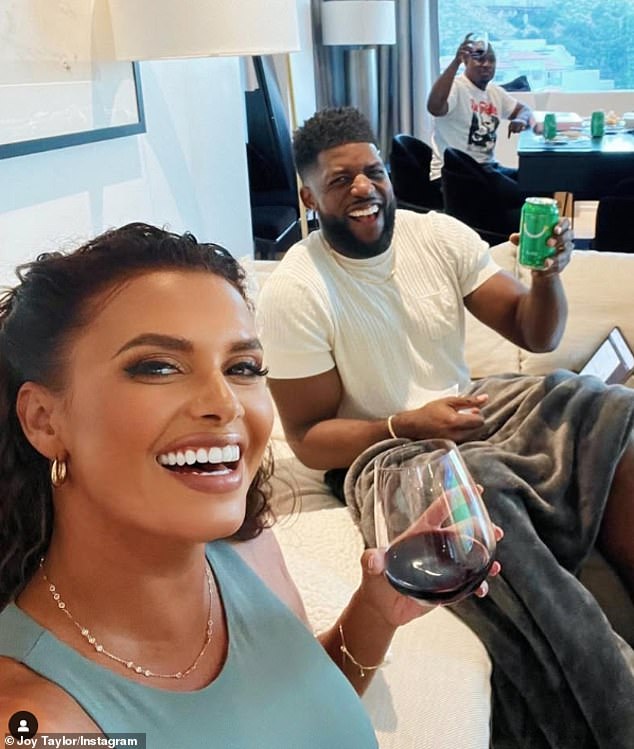 Joy Taylor (left) sits next to Emmanuel Acho prior to an FS1 broadcast