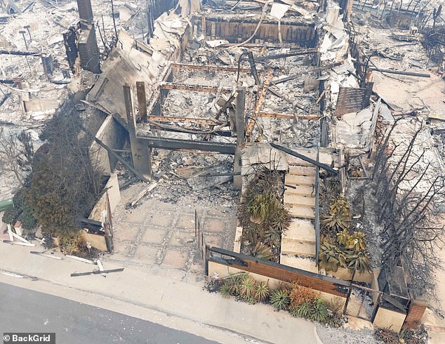 Photos reveal the charred remains of the classic colonial home, with little more than a scorched fence as the only trace of what was once a beautiful property