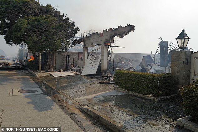 Now the building is charred and destroyed, with the facade of the garage decimated by the flames