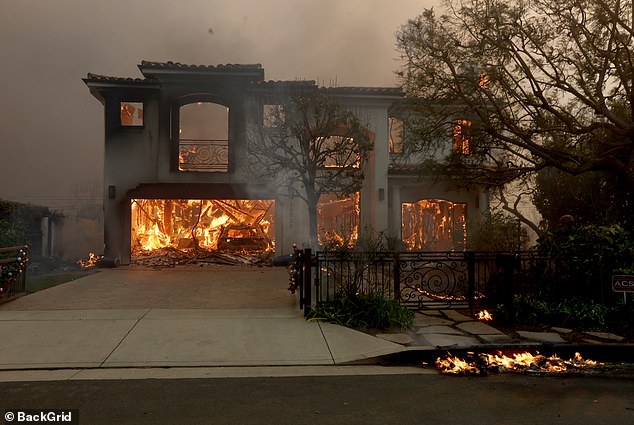 Across the street, his neighbor's mansion was covered in smoke and flames, and the entire back half of the mansion now seemed to no longer exist.