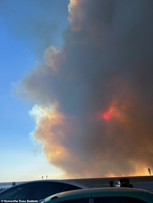 Baldwin said the wind came in so fast that smoke surrounded her and she couldn't see anything, so she made a break for the water where she could reunite with her father.