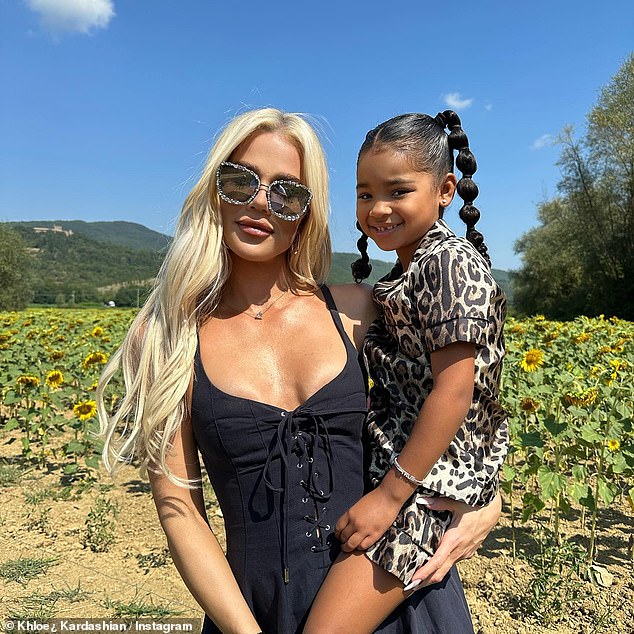 Khloe posted a sweet album of her and True frolicking through a field of sunflowers