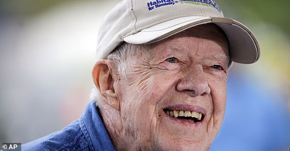 FILE - Former President Jimmy Carter answers questions during a news conference at a Habitat for Humanity construction site in Memphis, Tennessee, on November 2, 2015. (AP Photo/Mark Humphrey, File)