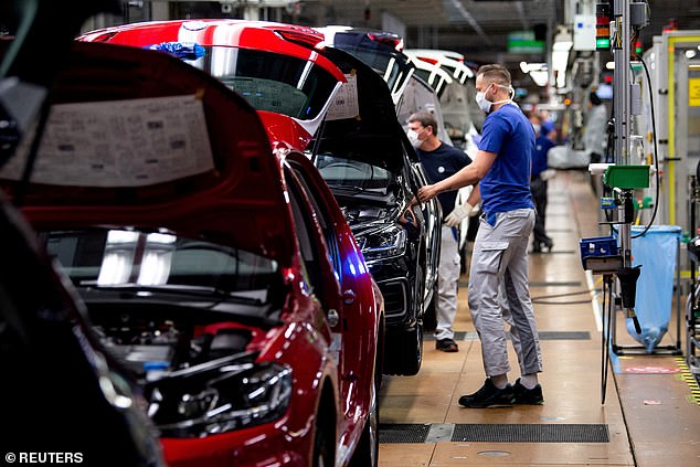 A worker on the Volkswagen assembly line in Wolfsburg, Germany. It is the employers who paid the price for the large number of absences - which cost them no less than 77 billion euros in wages