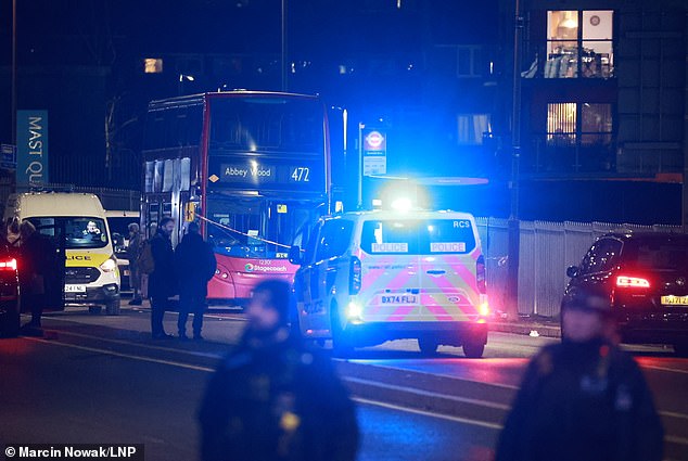 Police maintain a cordon after a teenager was fatally stabbed on a London bus on Tuesday, January 7, 2025