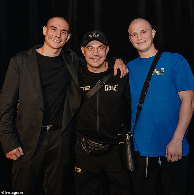 The ceremony was attended by only a few people, including Nikita's brother Tim (left) and father Kostya (center, pictured with Nikita)