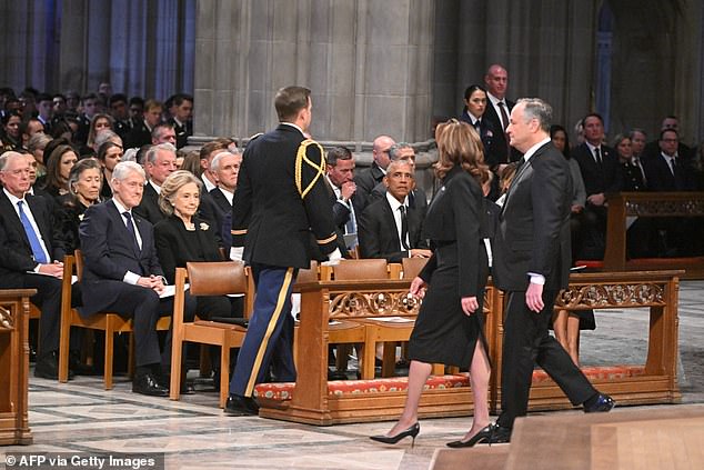 Kamala Harris and Doug Emhoff arrive at the funeral