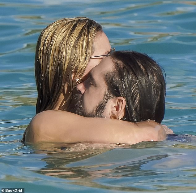 The couple hugged in the sea during the day amid the LA wildfires