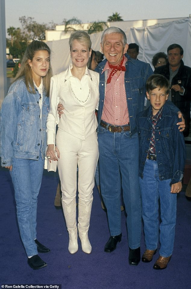 “I am in shock and processing this enormous loss for our family. I am beyond grateful for the memories. It was a really wonderful gift to have,” Candy told TMZ on Thursday; (Tori Spelling, Candy Spelling, Aaron Spelling and Randy Spelling at the Santa Monica Civic Center in 1990)