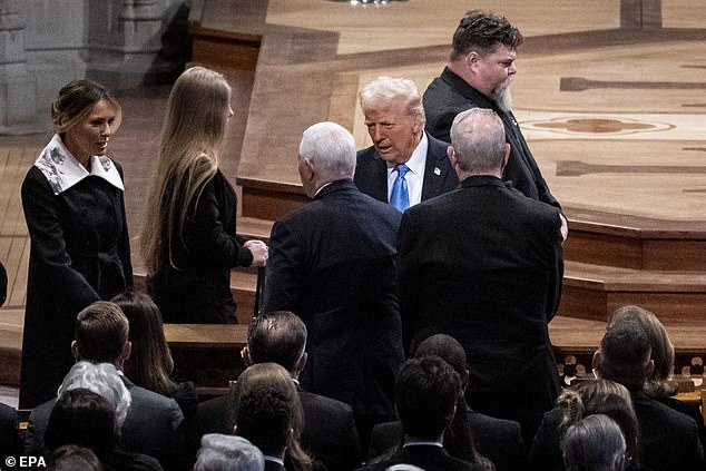 Karen Pence (bottom left) remains seated as Melania Trump and President-elect Donald Trump greet former Vice Presidents Al Gore and Mike Pence