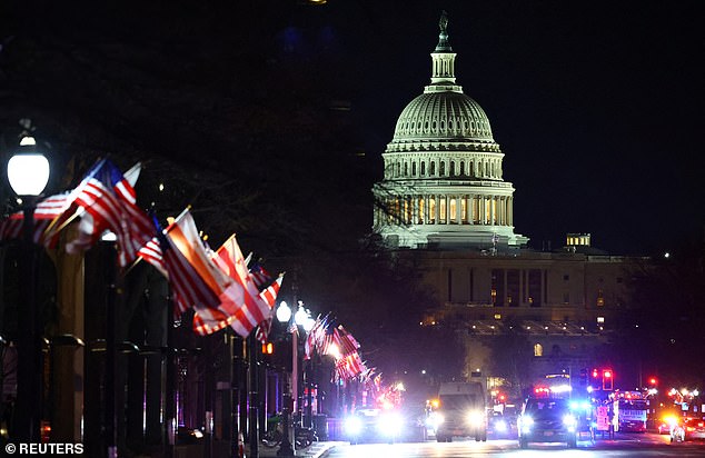 Flags fly near the US Capitol as preparations are underway for the upcoming presidential inauguration of newly elected US President Donald Trump.