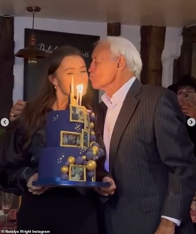 She also shared a throwback photo of him and her celebrating one of her birthdays while holding a blue three-tiered cake