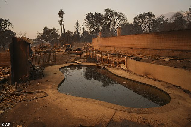 A swimming pool was the only structure left in this image from the Eaton Fire Thursday in Altadena, California