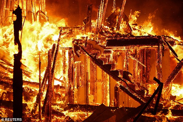 The devastating fires have so far claimed seven lives and leveled the homes of thousands of people (photo: Flames engulf a home in Pasadena, north of LA)