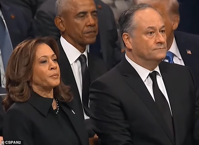 The most somber attendees were yet to come: Vice President Kamala Harris and Doug Emhoff.