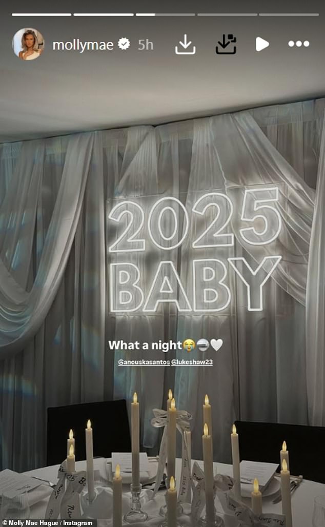 Hosts Luke and Anouska went all out as they decorated the venue with white curtains, candles in the center and a large neon white '2025 Baby' sign